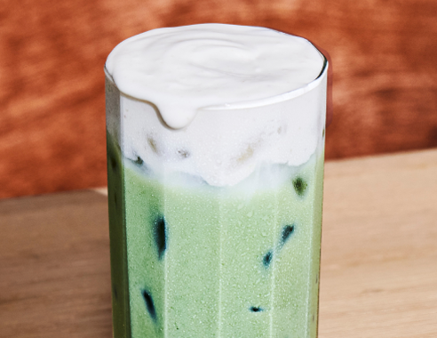 An iced Starbucks Matcha topped with creamy, protein cold foam.